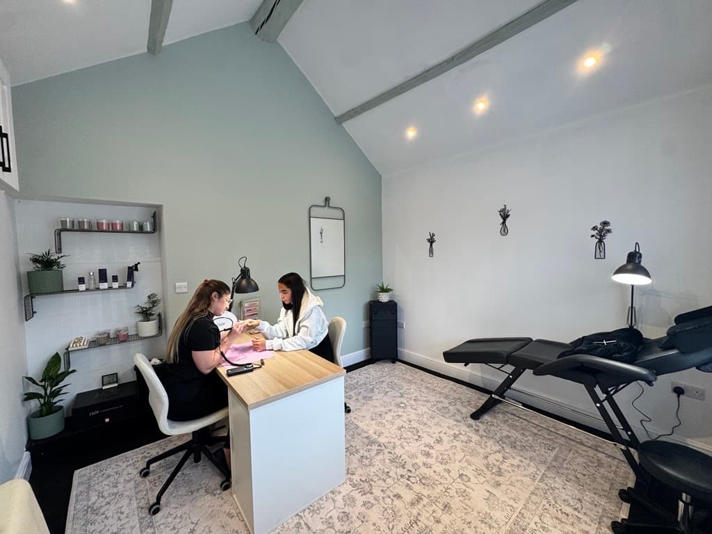 Jade working with a client at the bench